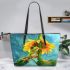 Adorable cartoon frog hanging onto the stem of a sunflower in full bloom leaather tote bag