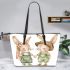 Adorable two bunnies holding hands dressed in green leather tote bag