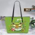 An adorable green frog eating ramen noodles leaather tote bag