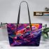 An artistic illustration of a frog in vibrant colors leaather tote bag