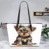 Baby yorkshire terrier puppy in full body isolated leather tote bag