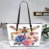 Beautiful dragonfly sitting on top of flowers leather tote bag