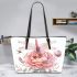 Beautiful watercolor dragonfly sitting on top flower leather tote bag