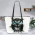 Black and white owl with bright teal eyes leather tote bag