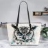 Black and white owl with teal highlights leather tote bag