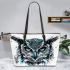 Black and white owl with turquoise highlights leather tote bag