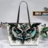 Black and white owl with turquoise highlights leather tote bag