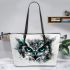 Black and white owl with turquoise highlights leather tote bag