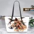 Brown horse with white and black feathers on its head leather tote bag