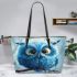 Cartoon blue owl with big eyes leather tote bag