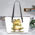 Cartoon frog standing on its hind legs leaather tote bag