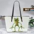 Cartoon frog standing on its hind legs leaather tote bag