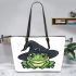 Cartoon green frog with black witch hat leaather tote bag