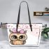 Cartoon owl with a pink bow on its head leather tote bag