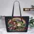 Cartoon tree frog sitting on top of an irish mushroom leaather tote bag