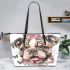 Cute and happy english bulldog puppy with pink roses leather tote bag