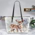 Cute baby deer in the snow leather totee bag