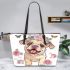 Cute baby english bulldog dog wearing a flower crown and butterfly leather tote bag