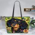 Cute black and tan dachshund among spring flowers with butterflies leather tote bag