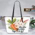 Cute bunny sitting on top of an carrot hello spring leather tote bag