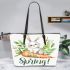 Cute bunny sitting on top of an carrot hello spring leather tote bag