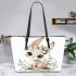Cute cartoon bunny with big eyes sitting on the flowers leather tote bag