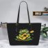 Cute cartoon frog playing guitar in a simple drawing leaather tote bag