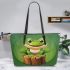 Cute cartoon frog sitting on a tree stump leaather tote bag