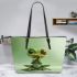 Cute cartoon frog with big eyes and hands leaather tote bag