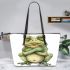 Cute cartoon frog with its front legs crossed leaather tote bag