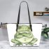 Cute cartoon frog with its front legs crossed leaather tote bag