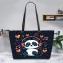 Cute cartoon panda listening to music on headphones leather tote bag