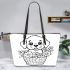 Cute cartoon style labrador puppy sitting in flower basket leather tote bag