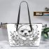 Cute cartoon style puppy sitting in flower basket leather tote bag