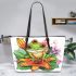 Cute cartoon tree frog with lily flower leaather tote bag