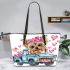 Cute cartoon yorkshire terrier with pink flowers in her hair leather tote bag