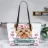 Cute cartoon yorkshire terrier with pink flowers in her hair leather tote bag