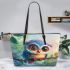 Cute colorful owl cartoon with big eyes sitting on a tree branch leather tote bag