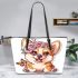 Cute corgi puppy with pink roses and a butterfly leather tote bag