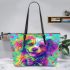 Cute dog with a bow leather tote bag