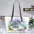 Cute dragonfly perched on an open book leather tote bag