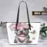 Cute grey pitbull puppy with a pink flower crown on its head leather tote bag
