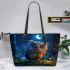 Cute owl cartoon with big blue eyes night scene with moon leather tote bag