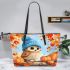 Cute owl in blue hat sitting on the log surrounded leather tote bag