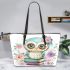 Cute owl sitting on books in the style of pastel colors leather tote bag