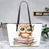 Cute owl sitting on top of books leather tote bag