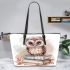 Cute owl sitting on top of books leather tote bag