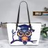 Cute owl wearing glasses and a graduation hat leather tote bag