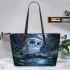 Cute owl with big blue eyes perched leather tote bag