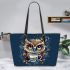 Cute owl with big yellow eyes holding a coffee cup leather tote bag